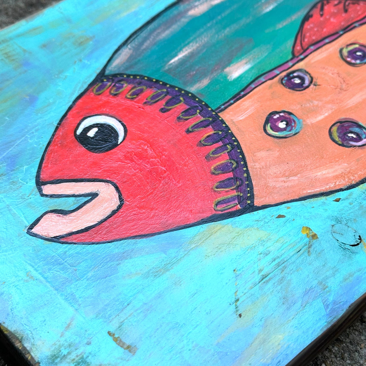 Stella-Painted fish on reclaimed hardwood, perfect for your lake life or coastal decor. Bright bold colors stand out on the stained wood.